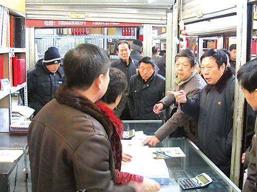 春节前的马甸邮市