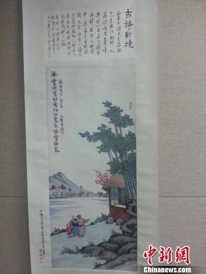 图为丰子恺的《年丰便觉村居好》 宗晨亮 摄