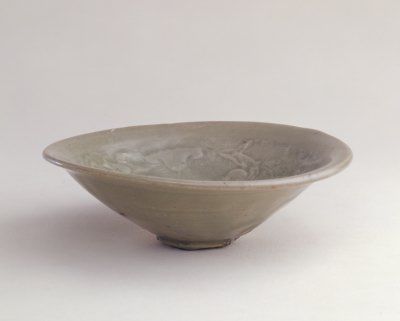 宋代耀州窑青釉印花童子玩莲纹碗鉴赏(图)