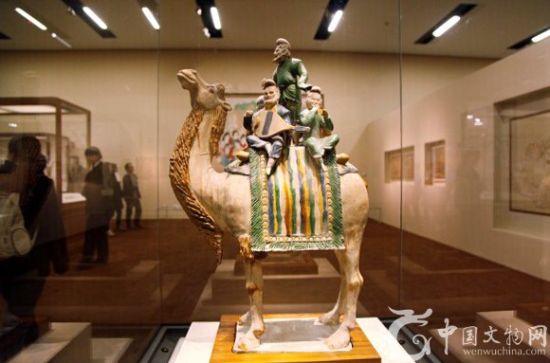 三彩骆驼载乐俑，唐代文物，1957年陕西省西安市鲜于廉墓出土，现藏中国国家博物馆。