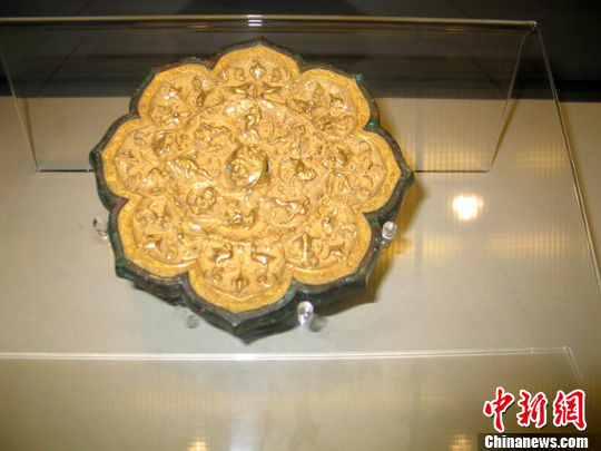 图为唐代海兽葡萄镜。 冽玮 摄