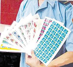 新手5000元买枚假邮票 投资须谨慎辨别